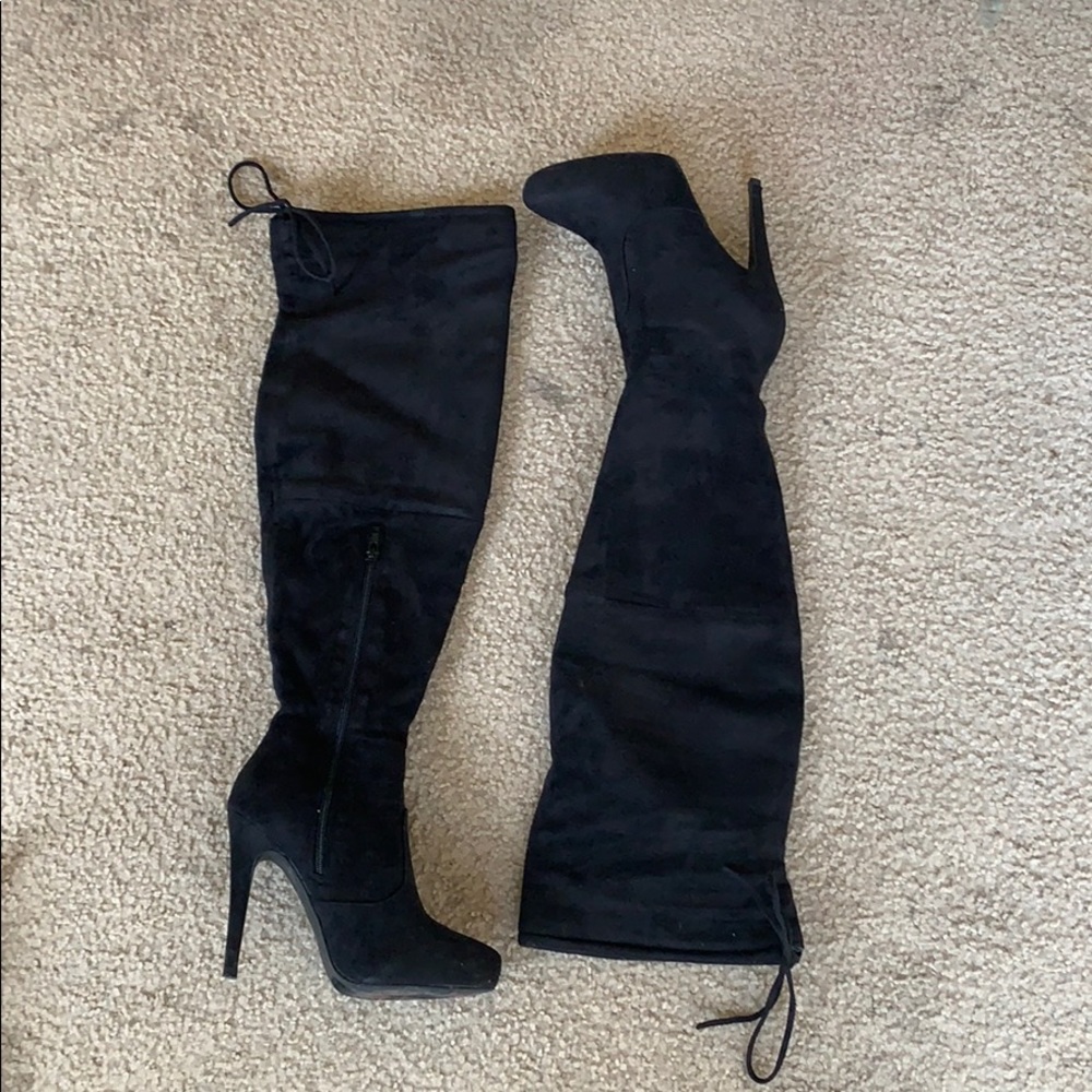 Over the knee, heeled boots.